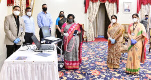 1 / 1 – Honourable Governor of Telangana, Dr. Tamilisai Soundararajan with Mr. Andy Ponneri & Ms. G. kameswari from Synchrony